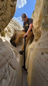 treasure hunter using super sensor in narrow mountain area